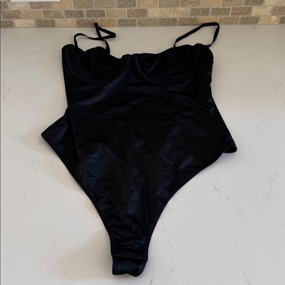 H&M Elegant Black Body Suit with low back. Size: 10 NWOT